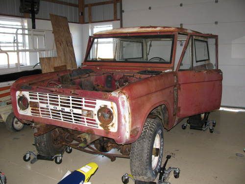 1969 ford bronco and 1971 parts bronco and 2002 gt40 5.0 still in mercury suv