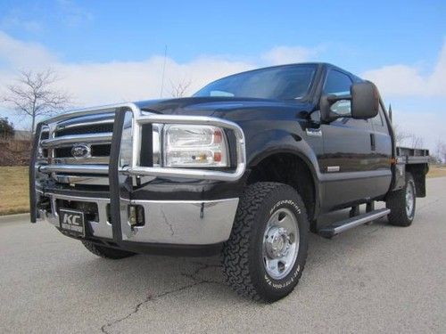 Super duty xlt 4x4 diesel 1 own with hydro bial spike bed only 70k miles!