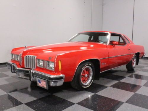 Bright red, 400 ci v8, power steering &amp; brakes, r134 a/c, luxury &amp; performance!