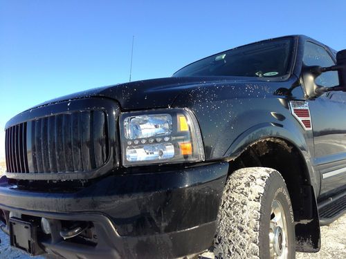 2003 ford excursion limited  4-door 6.0 custom 2008 7.3 diesel 4x4 black 20k