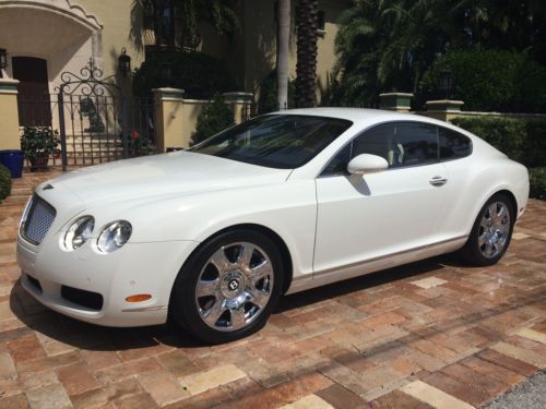 Gorgeous glacier white with magnolia interior and chrome wheels. low miles.