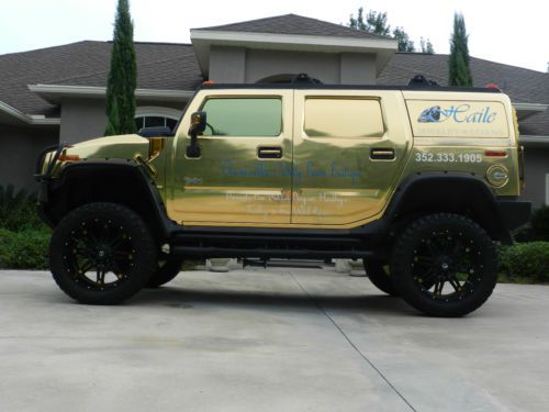 2007 hummer h2 chrome gold lifted with 24&#034; rims great for advertising 78,262 mi.