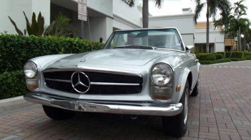 1968 mercedes benz 280 sl. silver with black. superb car. excellent running.