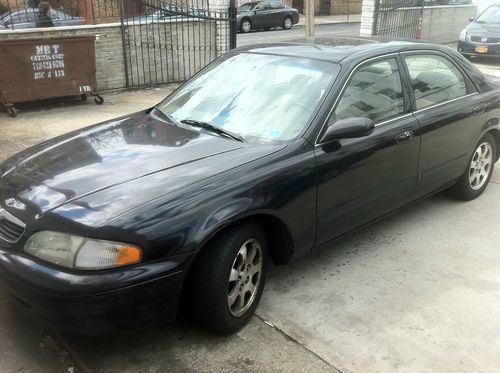 1999 mazda 626 lx sedan 4-door 2.0l mechanic special. car turns on, doesnt move.