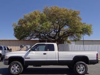 White hd ext cab 5.9l 4x4 cummins diesel long bed we finance we want your trade