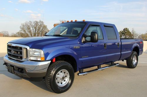 2003 ford f250 crew xlt fx4 7.3l diesel 76k original miles 4x4 nice no reserve !