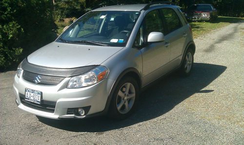 Suzuki awd crossover hatchback ,auto ,silver, 100000 mile warranty