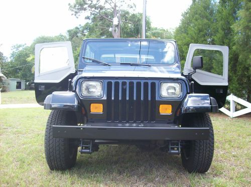 1989 jeep wrangler yj     23,332 miles showroom condition
