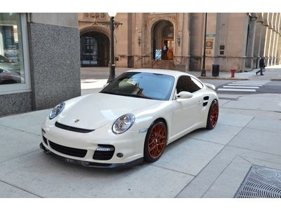 2009 porsche 911 turbo.  cream white with cocoa.