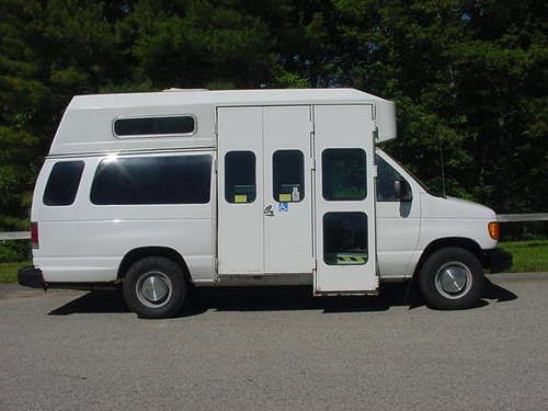 E-350  high top wheel chair van  make a nice food or ice cream truck a/c 1-owner