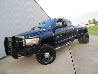 06 lone-star (6spd) 5.9l cummins h.o lift jl-audio exhaust ranch-hand carfax tx!