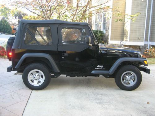 Low miles excellent condition, soft top, 4x jeep wrangler se, 6 cyl, trail rated