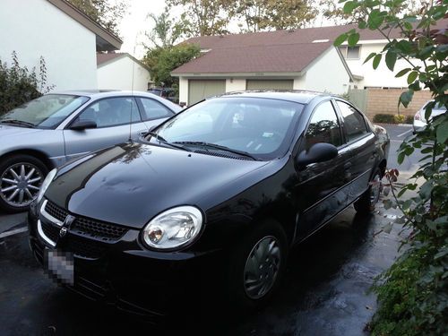 2005 black dodge neon; used