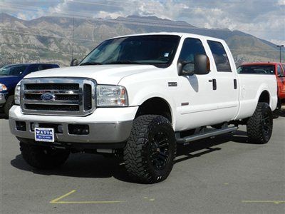 Ford crew cab powerstroke diesel lariat 4x4 custom lift wheels tires leather