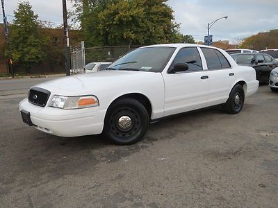 White p71 ex police 26k miles only pw pl cruise nice