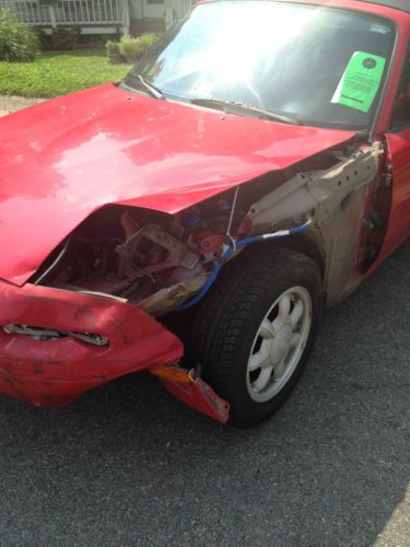 93 mazda miata convertable, runs great,147,000 miles, new top, needs body work