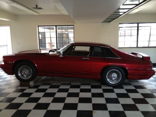 Beautiful candy apple red xjsh v12, newer repaint, original interior,