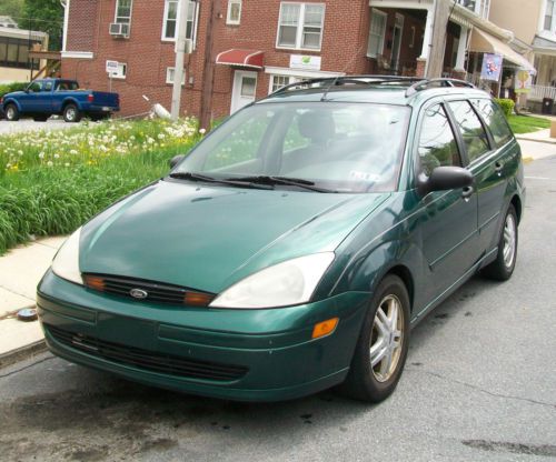 2000 ford focus wagon. good running car that needs a little tlc. check pics!