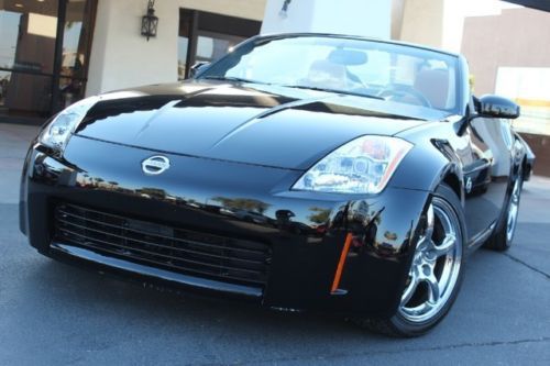 2005 nissan 350z convertible. enthusiast. 6 sp. very clean in/out. clean carfax.