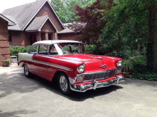 1956 chevrolet bel air 2door sedan. matador red with adobe beige. 350 cu in v8&#039;