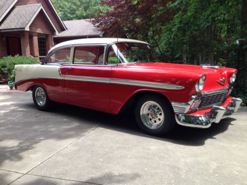 1956 Chevrolet Bel Air 2door sedan. Matador Red with Adobe beige. 350 cu in V8', image 2