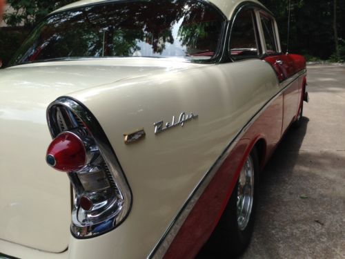 1956 Chevrolet Bel Air 2door sedan. Matador Red with Adobe beige. 350 cu in V8', image 3