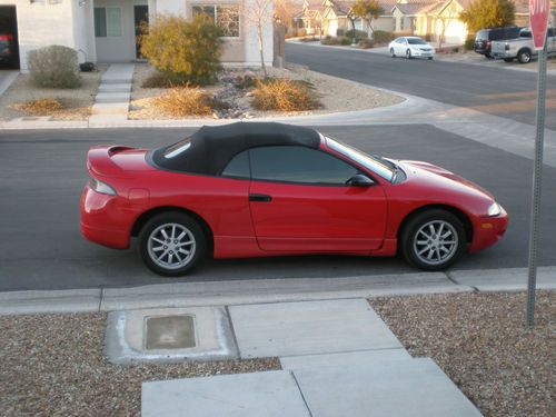 Red mitusbishi galant convertible