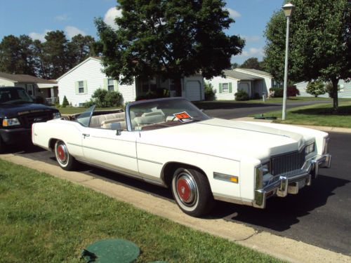 76,000 miles, triple white, good original condition, with extras included