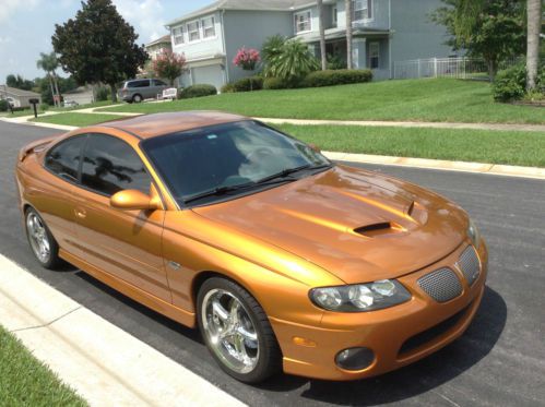 Pontiac gto 6.0 auto transmission, orange metalic, black leather seats