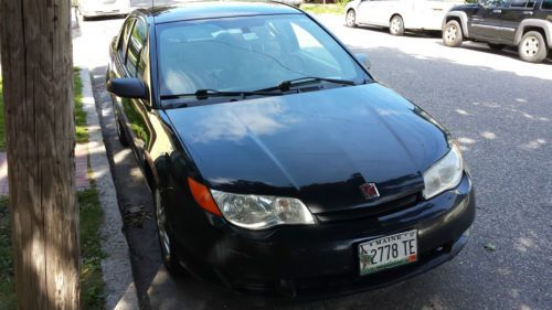 2006 black saturn ion 4 door coupe