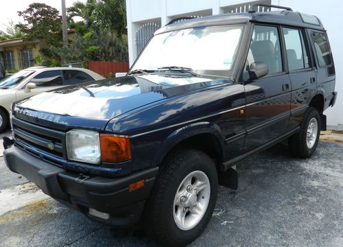 Blue land rover: range rover se 1997 discovery 4-door 7-passenger