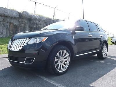 Tuxedo black panoramic moonroof 20" wheels ford my touch heated seats front/back