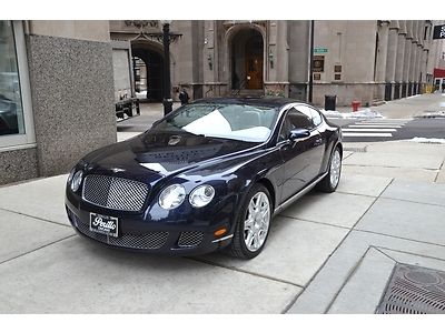 2009 bentley continental gt.  dark sapphire with linen.