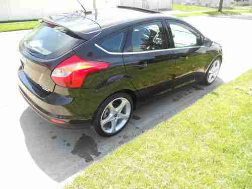2012 FORD FOCUS TITANIUM HATCHBACK 2.OL/NO RESERVE/5 SPEED/NAVI/HTD LTHR/SUNROOF, image 3