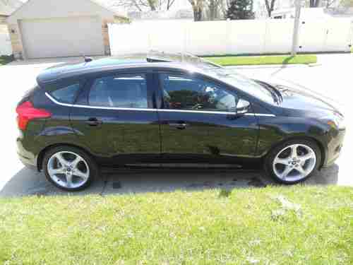 2012 FORD FOCUS TITANIUM HATCHBACK 2.OL/NO RESERVE/5 SPEED/NAVI/HTD LTHR/SUNROOF, image 4
