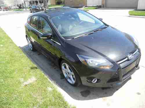 2012 FORD FOCUS TITANIUM HATCHBACK 2.OL/NO RESERVE/5 SPEED/NAVI/HTD LTHR/SUNROOF, image 5
