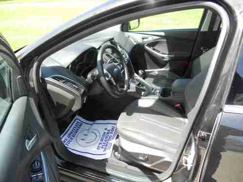 2012 FORD FOCUS TITANIUM HATCHBACK 2.OL/NO RESERVE/5 SPEED/NAVI/HTD LTHR/SUNROOF, image 7