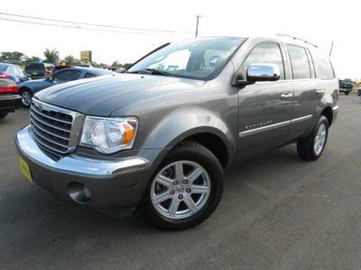 Suv 4.7l cd , wood grain, premium wheels, chrome, 3rd row, cloth, e85, clean.