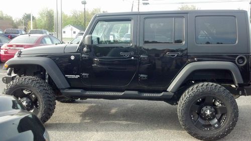 2010 lifted jeep wrangler unlimited sport islander 4x4 4-door hard top