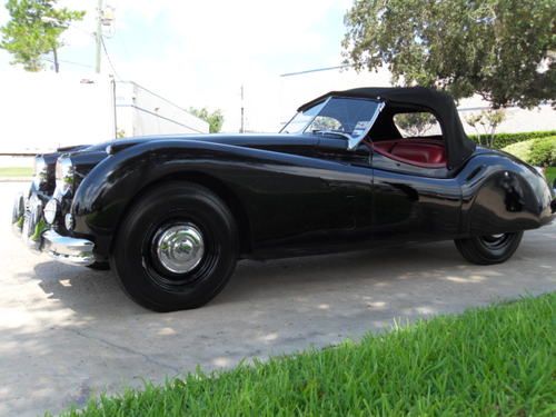 1956 xk140  roadster with spats undergone a complete frame off restoration