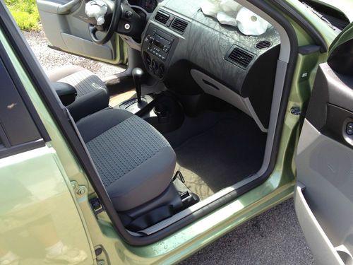 2007 Ford Focus SE Sedan, Power window/locks, Salvage, Damaged, Rebuildable, image 16