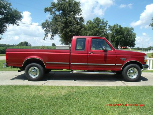 Red 1996 ford f-250 power stroke diesel