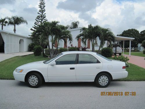 98 camry le low miles ,,,to settle estate