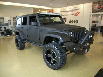 Rhino lined jeep must see pics lifted, light bars wench wheels loaded cool black