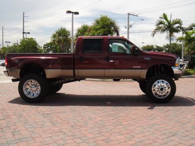 2004 f350 lifted monster pickup,..low milage,..pwr stroke diesel 4x4