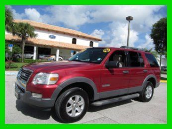 06 red 4l v6 7-passenger suv *running boards *side airbags *rear climate control