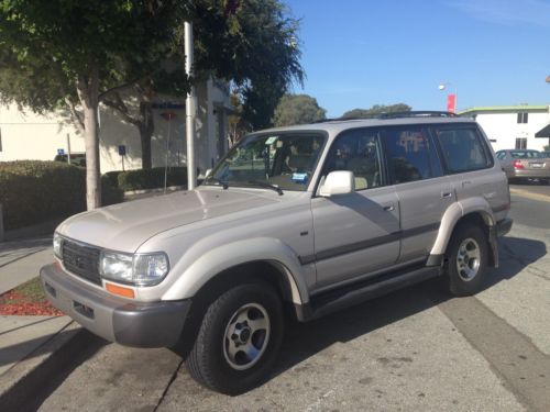 Beautiful 1997 toyota land cruiser in desert dune