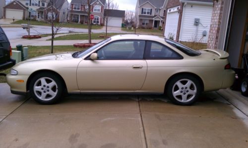 1995 nissan 240sx- se 2.4 l , gold in color, 5speed manual trans, good condition