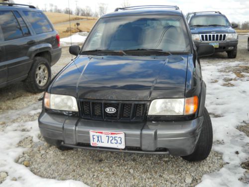 2002 kia sportage base sport utility 4-door 2.0l no reserve