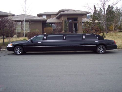 2002 black lincoln town car limousine in great shape with new motor.